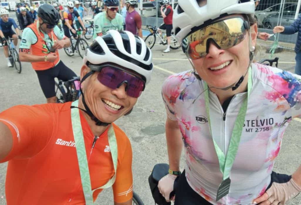 Mallorca 312 2025 Ride Report
Ever put on sunscreen at 4am in the dark and line up in the rain for a ride? I can now say I have, along with 8500 people on closed roads with 2600 people doing the 312 distance.
We went fast out the blocks – hanging on to various pelotons – before we hit the congestion on the first climb.
The first small descent was busy and then the descent from Puig Major was rather interesting, it’s a lovely descent with smooth winding lines into switchbacks, just with people flying down it at 60kmph. At the bottom we thought the route was flat for a while – turns out it was only flat for about 100m before we climb again.
The ride along the MA-10 is lovely and the road has been resurfaced near Andratx. There were crowds in the many small towns cheering us on.
Other participants were friendly – some were even just having a chat on their phones – and we met a guy who pre warned us of 3 climbs after Andratx. 1st was lovely, 2nd was horrendous, 3rd I don’t even remember… but intend on seeking them out again in Oct when we return with the club.
The big trains were a load of fun… they are often 30+ in size but unfortunately, everyone seemed to pick the biggest guy in the group (me) and try to ride behind them.  Sharing the work wasn’t high on people’s priorities.
Most of the climbing is front loaded so if you can get through the first 150ish kms, and do the rolling hills to 220 kms, a few more rolling hills and then the last 30 kms was fast and mostly downhill.
We rolled over the finished line with a clock time of 12:19 (rounded down 😉) and Jo was the stronger of us two… dragging us over the last 100 kms.  She finished 41st female out of 170. We were super pleased with our result… I think Jo was super pleased I would finally stop cracking the joke “31 too many!”. 100% recommend to anyone looking for a 2026 challenge!